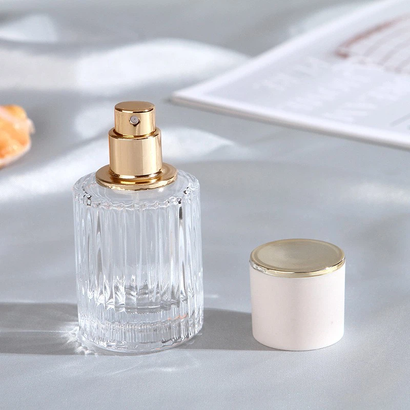 Sunshine High-End 30ml 50ml Cosmetic Packaging Clear Crimping Glass Perfume Bottle With Pump Spray Cap With Sticker